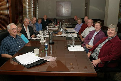 meeting - people seated around a table