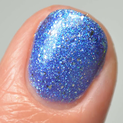 blue metallic nail polish close up swatch