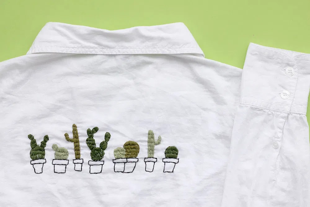 Kaktusbroderi på vit skjorta