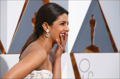Priyanka Chopra in white dress at Oscars 2016 stills