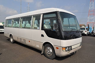 1999 Mitsubishi Rosa Suoper Long High Roof CX to Tanzania