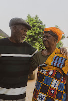 Elderly couple walking together