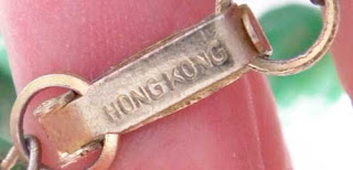 Hong Kong tag on necklace