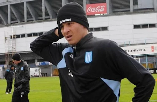 Racing Club player Giovanni Moreno was threatened at gunpoint by several hooligans