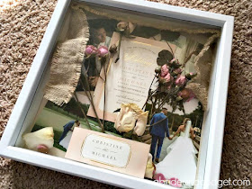Preserve your wedding items with a beautiful DIY Wedding Flowers Shadowbox. Get the tutorial to make one on www.abrideonabudget.com.