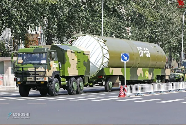 DF-5B first-stage carried inside a canister container during the parade