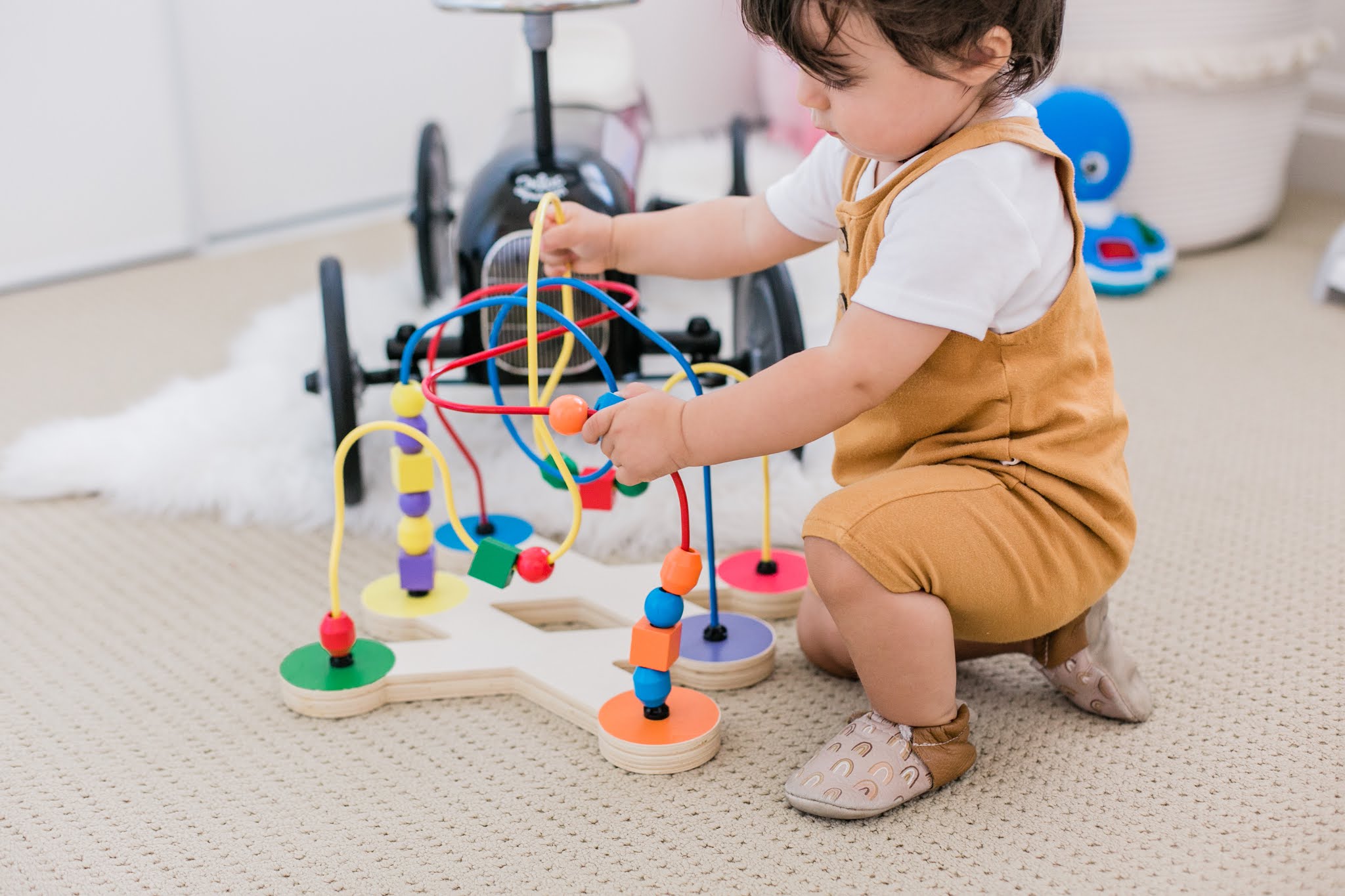 wooden toys in gender neutral nursery