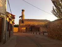 Sunrise and storks nest at village after leaving Astorga