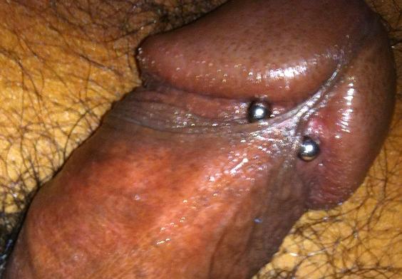 Entire view of penis with piercing