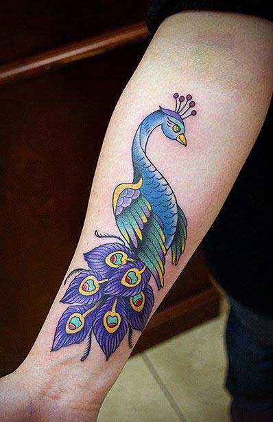 peacock tattoos on arm