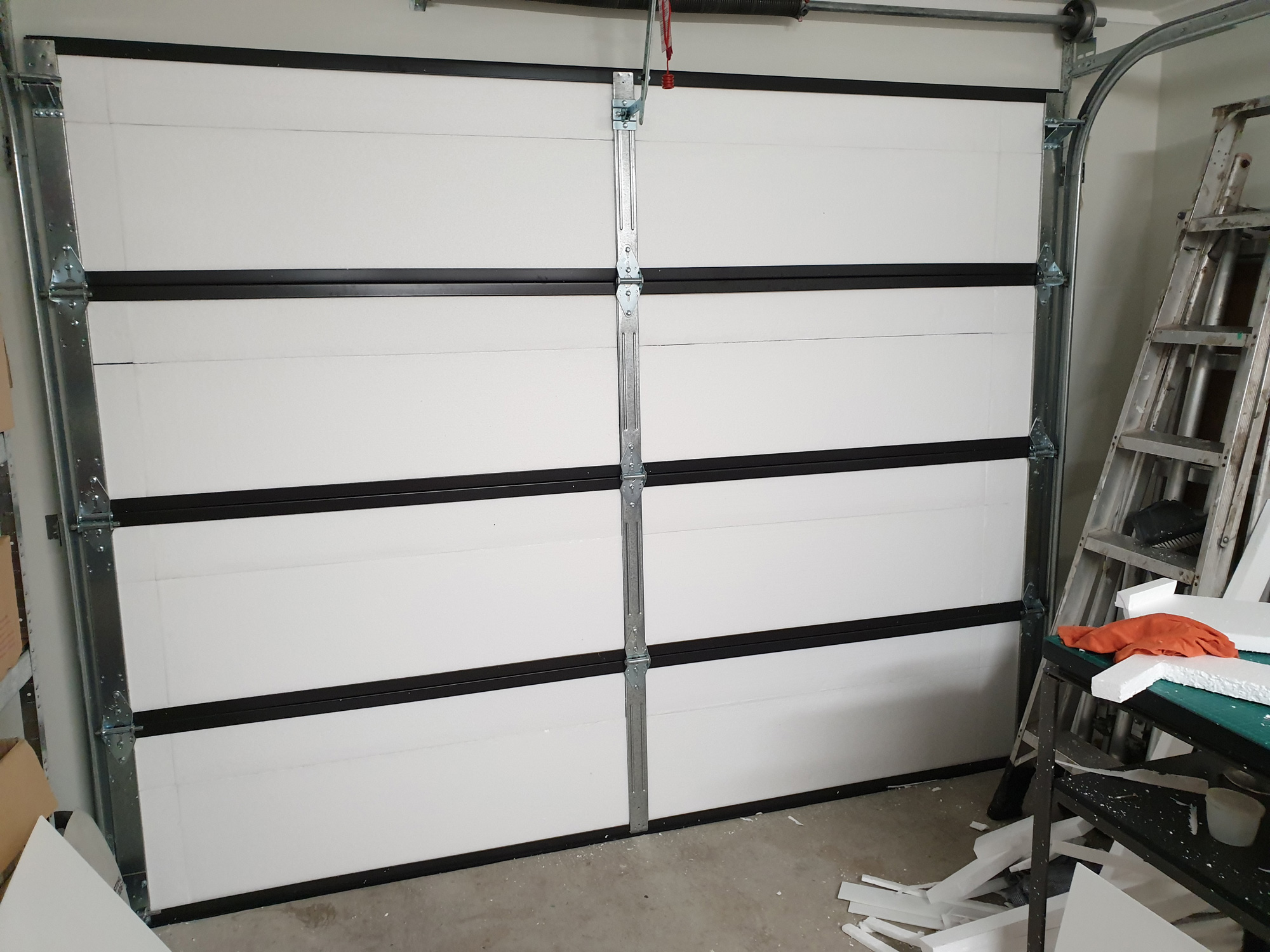 The garage door with all of the polystyrene installed