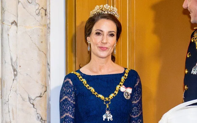 Crown Princess Mary wore a burgundy velvet gown by Birgit Hallstein. Princess Marie wore a navy lace gown