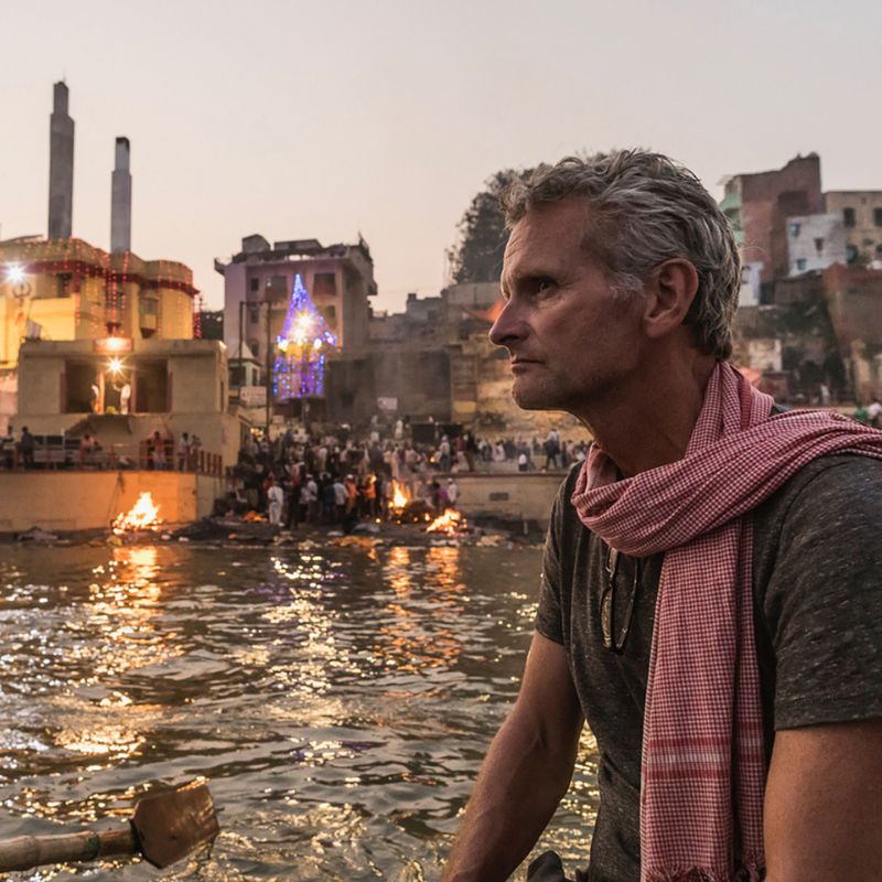 Paul Salopek on a boat along the sacred Ganges River in Varanasi, India