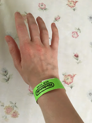 Nintendo NY New York green wristband wait in line