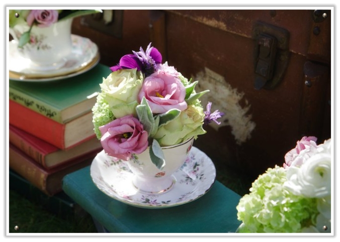 We kick off with vintage tea cup flower arrangements