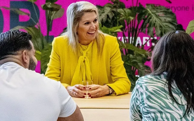 Queen Maxima wore a new yellow satin tie neck blouse by Zara. Yellow double breasted blazer and trousers by Zara