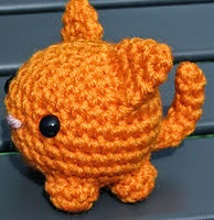 http://www.ravelry.com/patterns/library/modified-roly-poly-cat-amigurumi