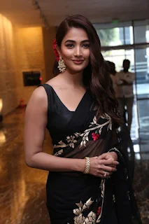 Pooja Hegde Saree Stills at Acharya Movie Press Meet