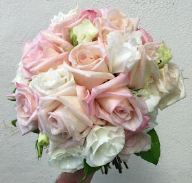 Pink and white wedding bridal clutch bouquet by Stein Your Florist Co.