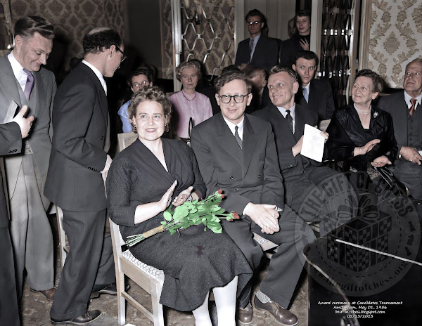 Award ceremony at Candidates Tournament World Chess Championship in Amsterdam, May 01, 1956. Winner of tournament, Vasily Smyslov and wife. Second from left, David Bronstein.