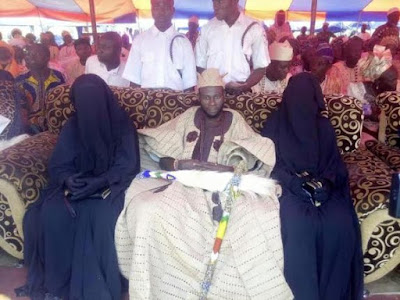 Photo: Wives of Olowu of Owu seen at a function in complete hijab sitting next to him