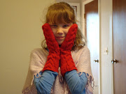Cheyanne showing off her New Twilight Bella Mittens I made her.