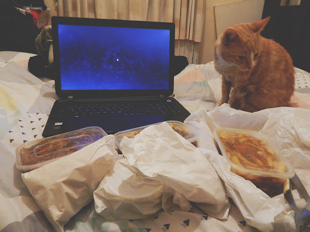 Chinese food, laptop, and cat