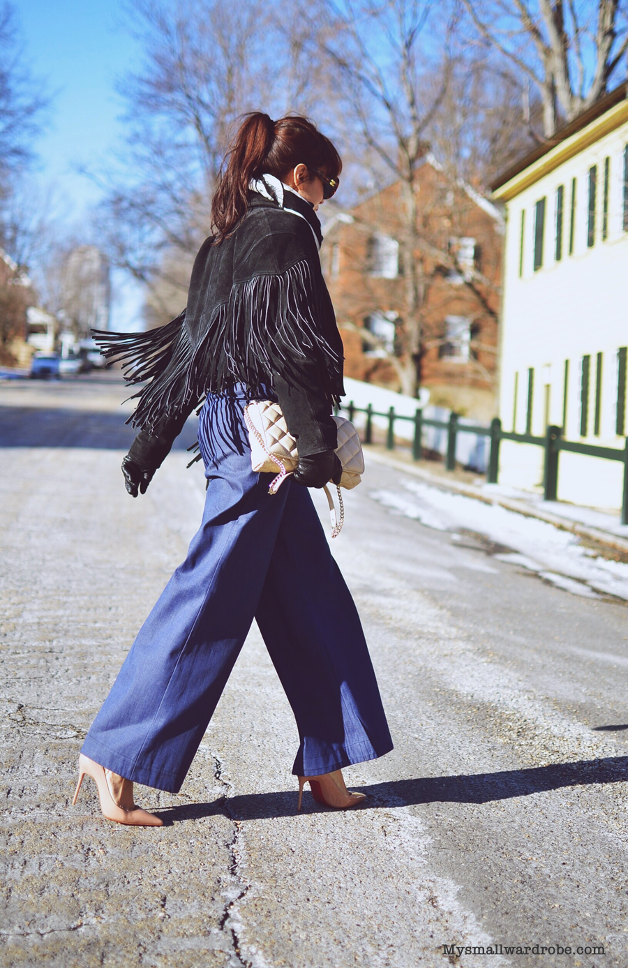 Outfit with wide leg pants and fringe jacket 