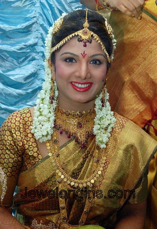 South Indian actress Rambha with traditional gold bridal jewellery including