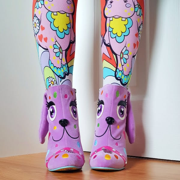 wearing lilac dog ankle boots with hippo patterned tights