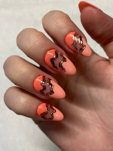 Peachy Pink Coral French Tip Nails with Rose Gold Swirls