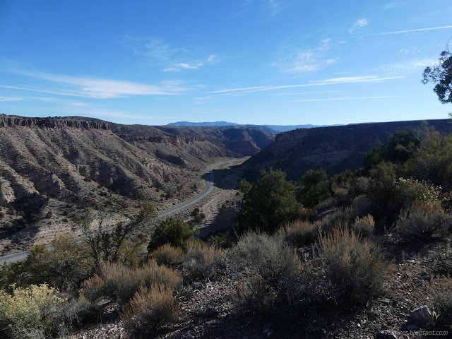 02: road snakes downward among cliffs