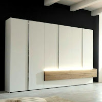 White modern wardrobe design with cool lighting