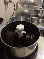 Melange grinding cocoa beans into chocolate liquer