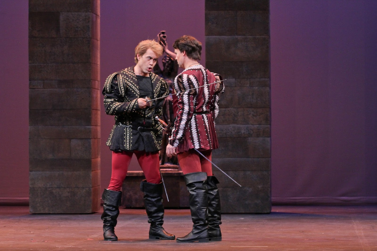 IN PERFORMANCE: Tenors BRIAN ARREOLA as Tybalt (left) and JONATHAN BOYD as Roméo (right) in Opera Carolina’s production of Charles Gounod’s ROMÉO ET JULIETTE, January 2016 [Photo by Jon Silla, © by Opera Carolina]