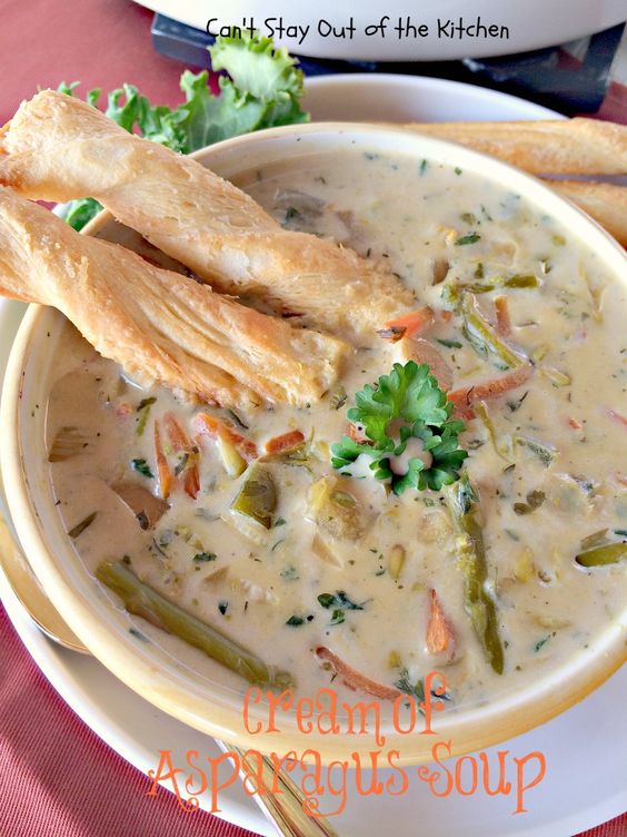 Savory and tasty crockpot recipe for asparagus soup. Lovely texture and taste. This gluten free recipe includes mushrooms, bell peppers, carrots and lots of seasonings that make it really tasty.