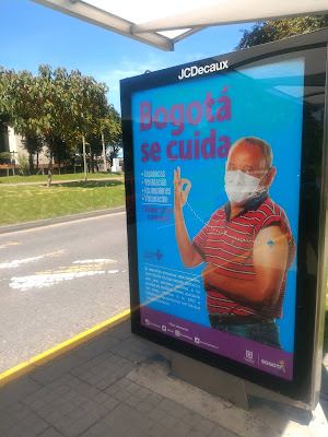 Along came a virus: A bus shelter poster in Bogotá, Colombia asking people to protect themselves from covid-19.