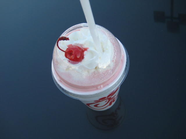 A top-down view of Chick-fil-A's Peppermint Chocolate Chip Milkshake.