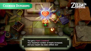screenshot of Link getting a Heart Container from Dampé