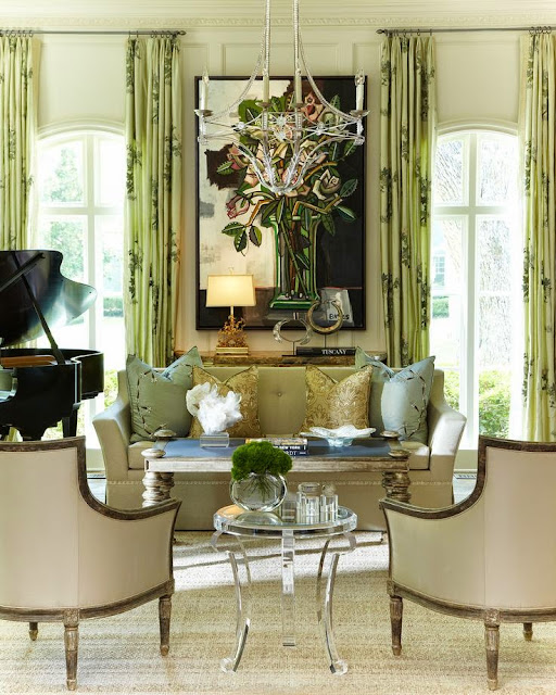 beautiful transitional living room pop of green color