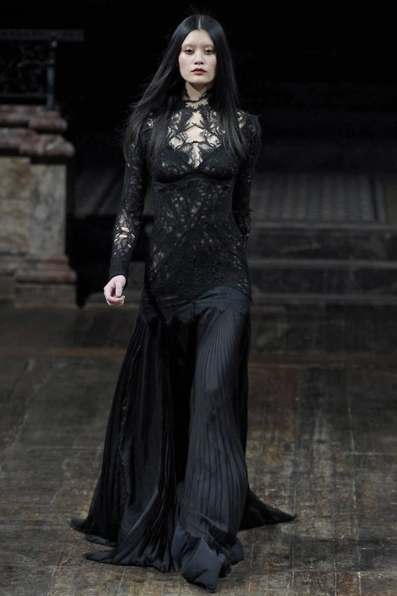 model wearing a black gothic dress on the Julien Macdonald, London Fashion Week