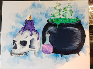 A painting by Hannah Claire depicting a still-life of a skull with dripping purple candle on top, a bubbling pink potion, and a large black cauldron.