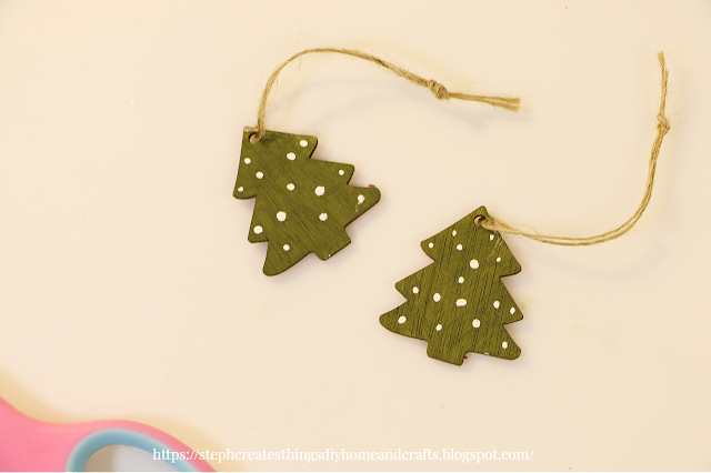 Mini green wooden trees with white dots