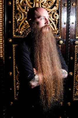 The man with Britain's longest beard measuring over 2ft has been growing it for six years