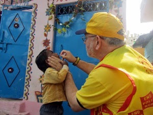 Paul giving vaccine
