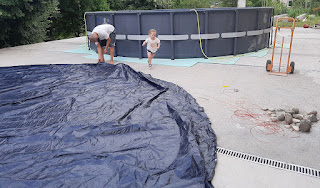 Setting out the new pool cover