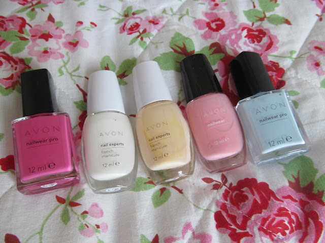 5 nail polish bottles lined up (hot pink, white, cream, pale pink, mint)