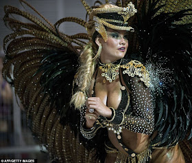 Got rhythm: a queen of the drums of the Rosas de Ouro samba school performs during the first night of Sao Paulo's Carnival parades.