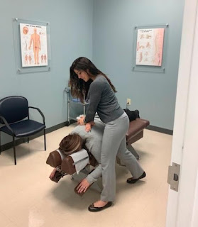 chiropractic patient being treated for back pain after a car accident in McDonough