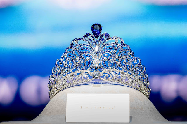 Image of the Miss Universe Crown with pear-shaped blue sapphires surrounded by diamonds. The Crown Number 12 Force for Good as titled by the Miss Universe Organization is crafted by world-renowned luxury jeweler Mouawad.